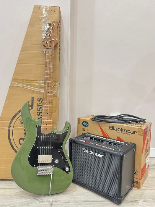 Продам электро гитару с усилителем