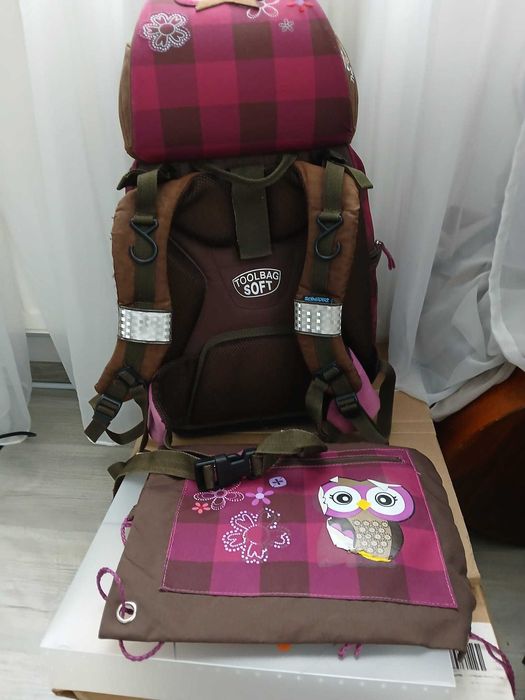 Ghiozan ergonomic scheider cu saculet de sport  in stare foarte buna .