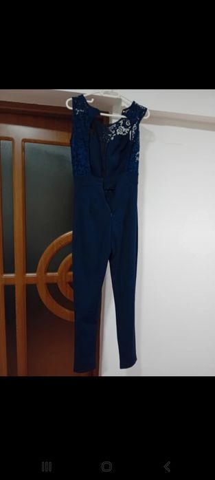 Vând salopeta albastra