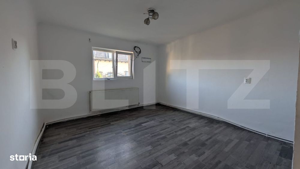 Casa cu 2 camere si mansarda ,plus bucatarie de vara .