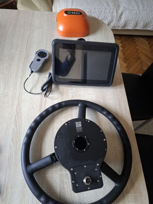 Autoghidare prin GPS pentru tractoare, combine și autogredere