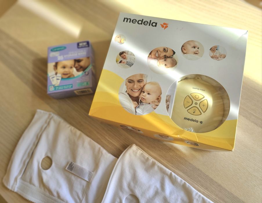 Двойна помпа за кърма Medela Swing Maxi + биберон Calma + подарък
