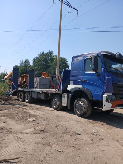 Грузовой эвакуатор или трал