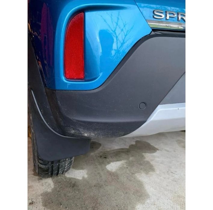 Dacia Spring Accesorii - apărători noroi, deflector aer, organizator consola