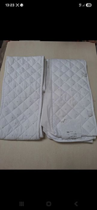 Cearceaf cu apărători la pătuț..