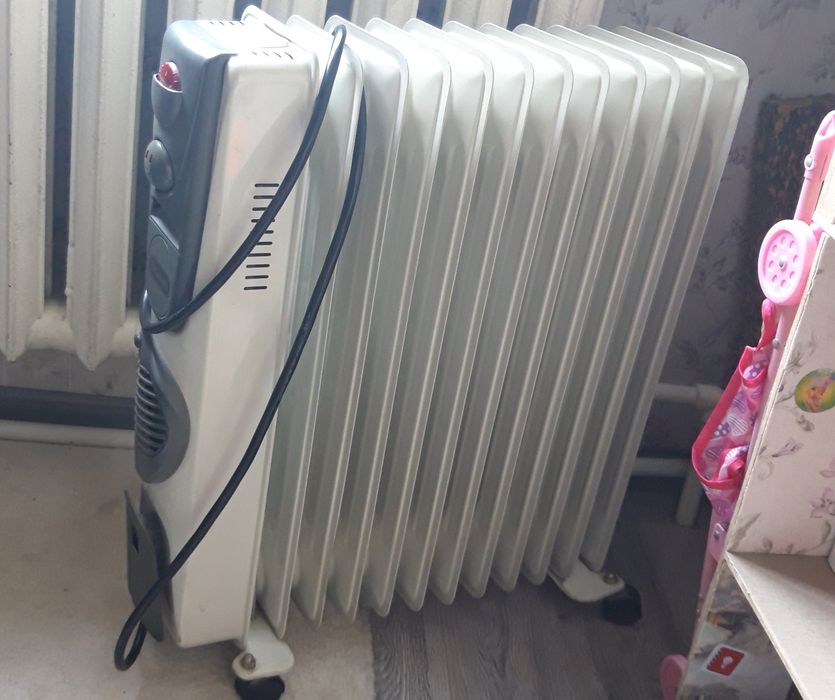 обогреватель "DeLongni"