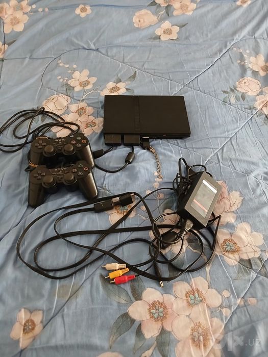 Playstation 2 original joystigi bilan