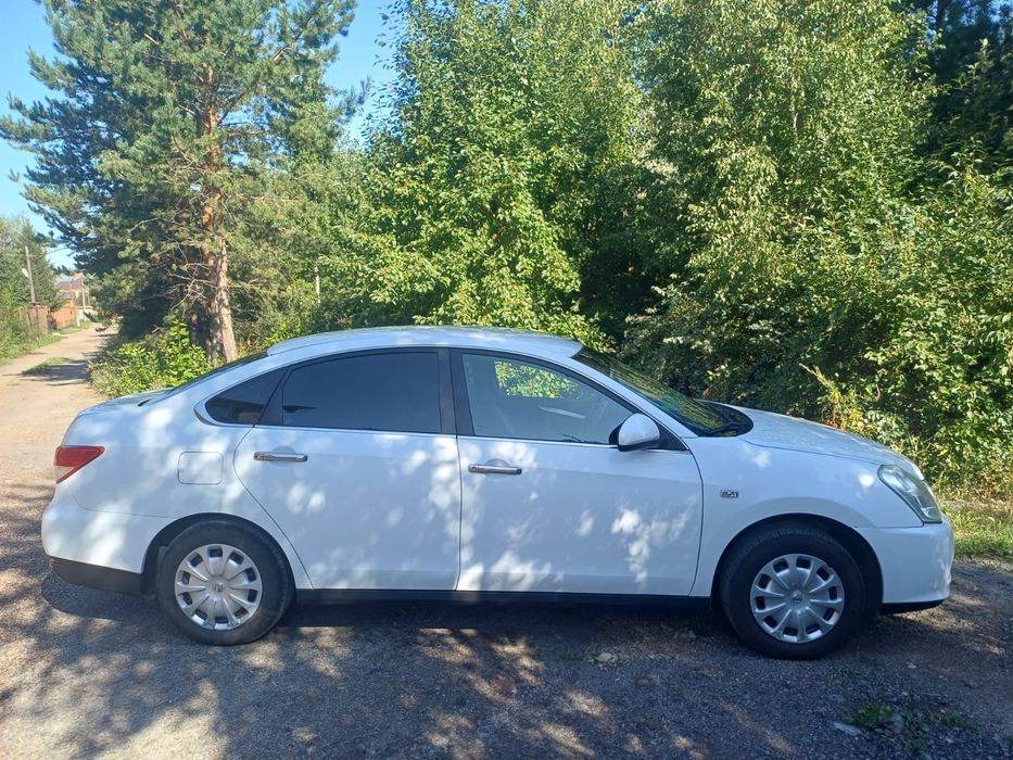 Nissan Almera 2014 1.6 л