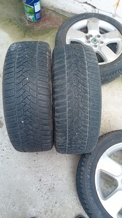 Vand patru jante originale skoda octavia scout cu tot cu cauciucuri.