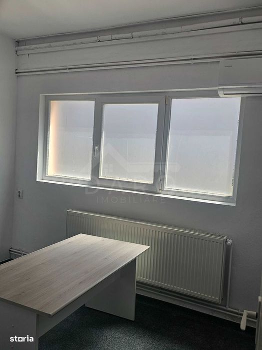 De închiriat spatiù comercial