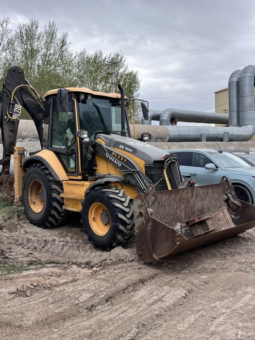 Экскаватор погрузчик 3 в1