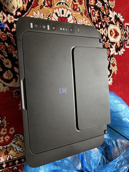 Canon E414 …………..