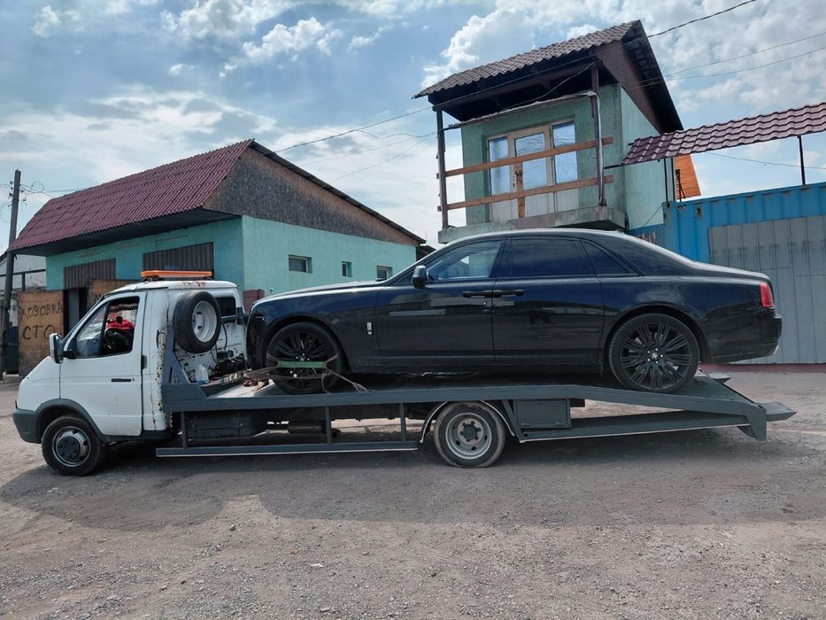 Перевозка авто эвакуатором по Алматы