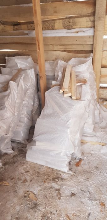 Дрова в мешках 1200тг