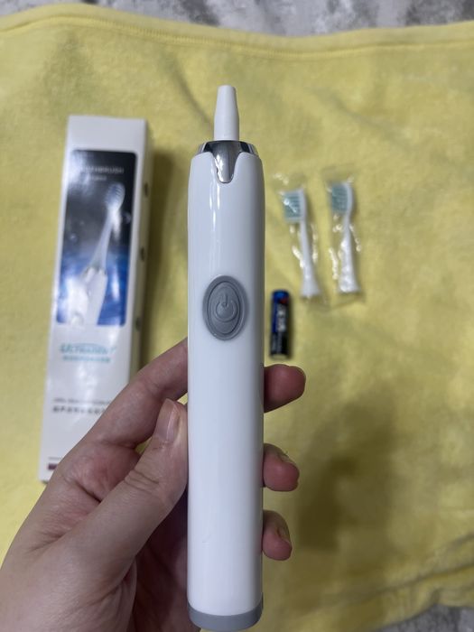 Электронная зубная щетка