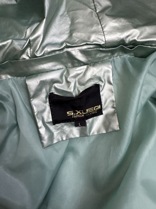 женские куртки и пуховики