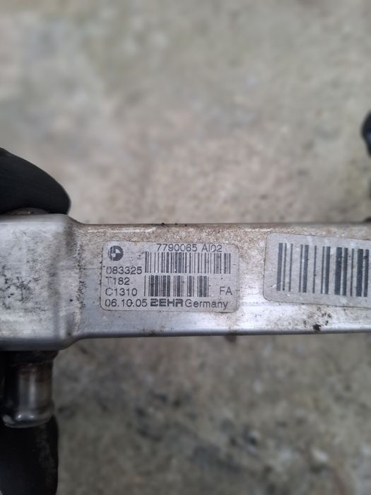 Racitor gaze bmw e90 2.0 d an 2005