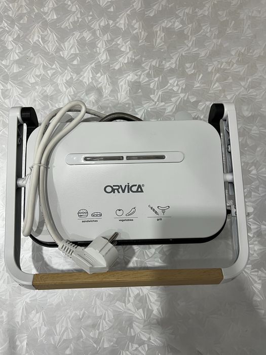 Продам новый электрогриль ORVICA