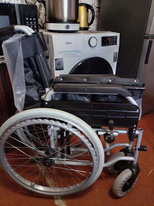 Инвалидная коляска