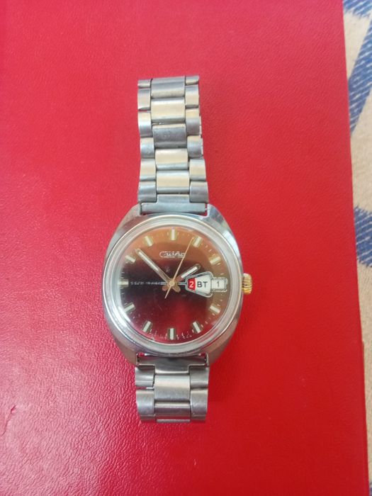 часы Слава 26 камней ( СССР ) двойной календарь