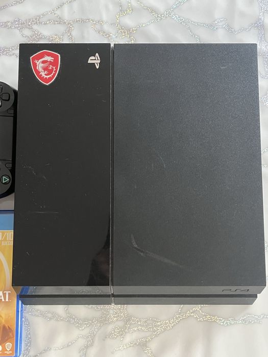 Продаю PlayStation 4
