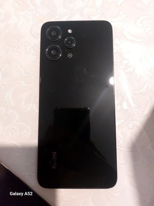 Телефон  Redmi 12 256/12 в идиале
