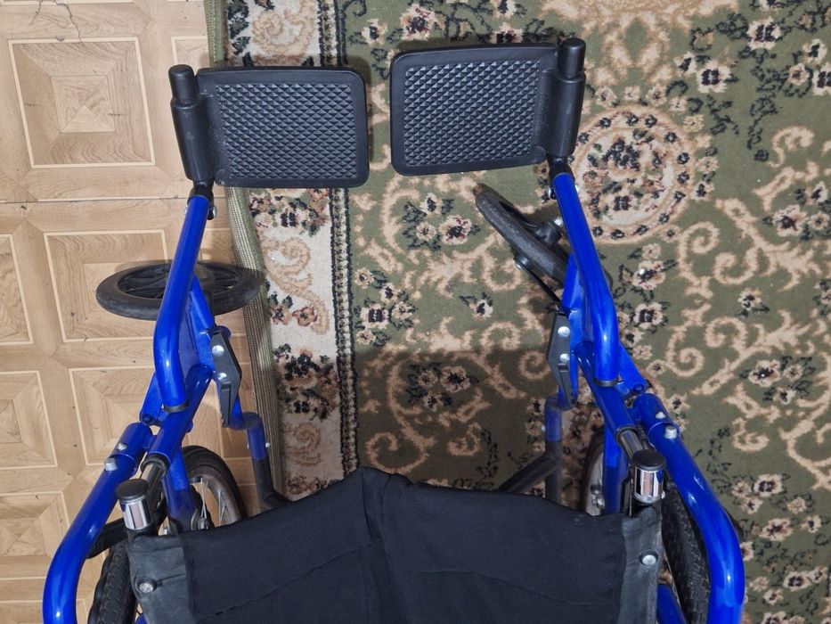 Инвалидная коляска