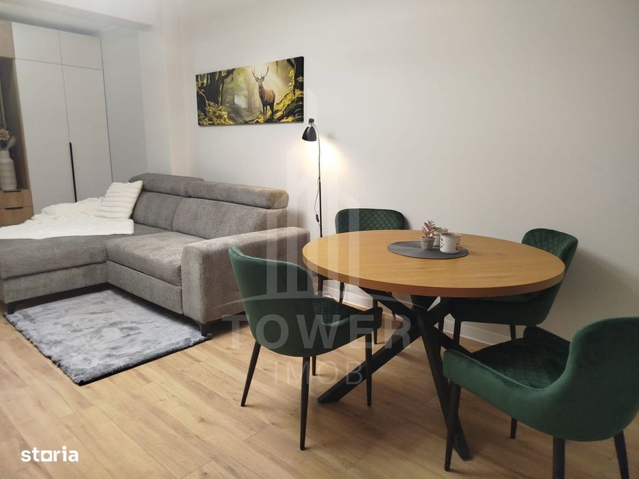 Apartament modern de închiriat, cu balcon și loc de parcare