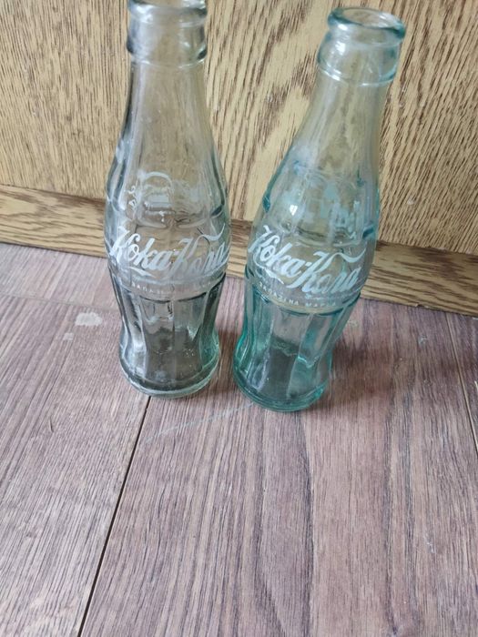 Бутилки от Кока кола на кирилица