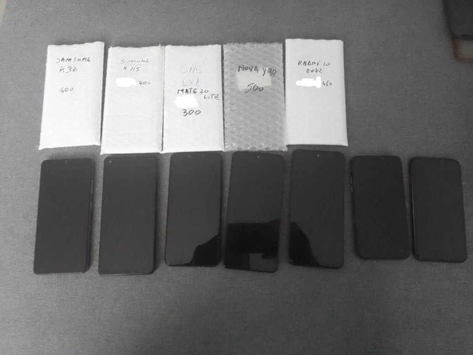 Vind telefoane recarosate întrebați de pret