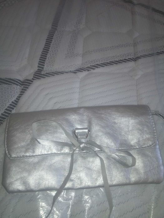 Продам кошелек-косметичку.новую.стильную.35,500т