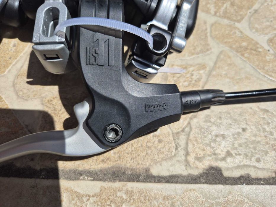 Set frane hidraulice Magura HS11-EVO2, inclusiv 2 perechi saboti noi