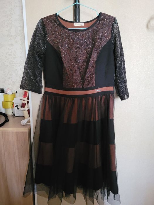 Женские платья, туники.