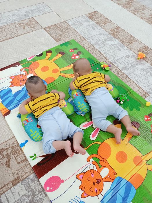 Подушка баланы ішпен жатқызуға