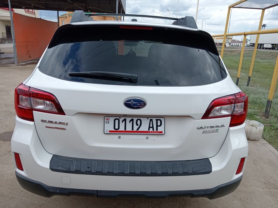 Субару аутбек универсал