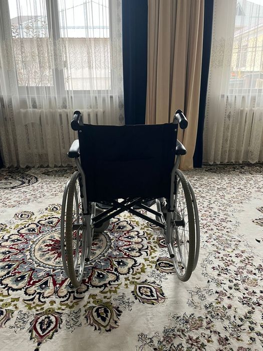 Инвалидная коляска