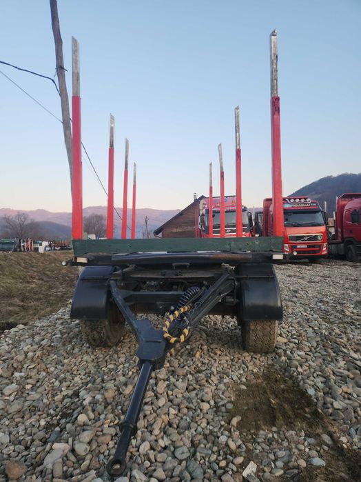DOLL forestiera transport lemn , busteni si racoante din dezmembrări