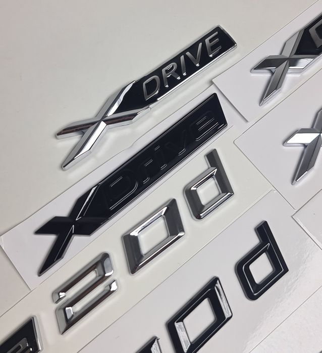Emblema-Sigla-Logo-Stema-Xdrive-Bmw-20d-30d-35-40d-X1-X3-X4-X5-X6-F36-F32-F01-F25-F26-G01-G02-G11-G30-G20-F10-F30-E70-E71-F15-F16-G05-G06-Negru-Lucios