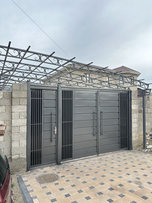 Покраска ворот заборов