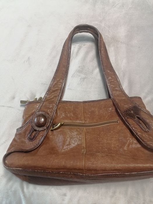 Коженная сумка коричнего цвета