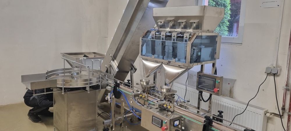 Linie de imbuteliat apă, creme, granulate, produse mixte