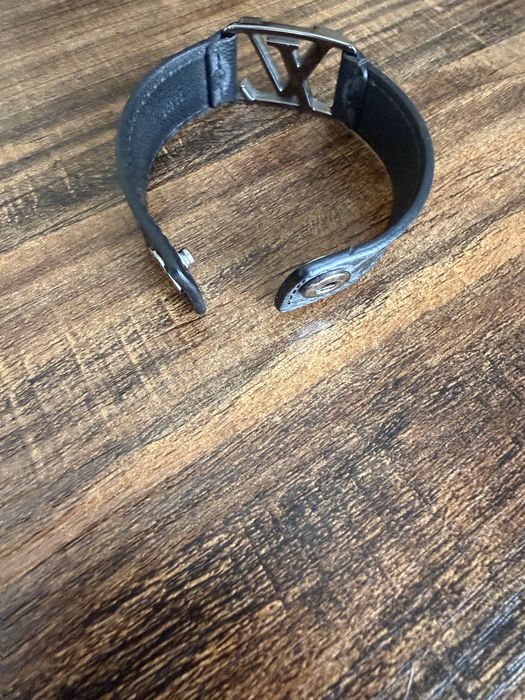 Louis Vuitton LV Initials bracelet, black leather with silver-tone hardware.