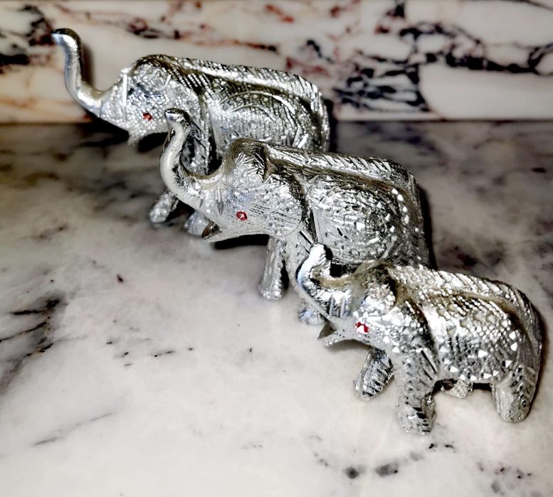Антикварни декоративни фигурки на слонове изработени от герм. сребро