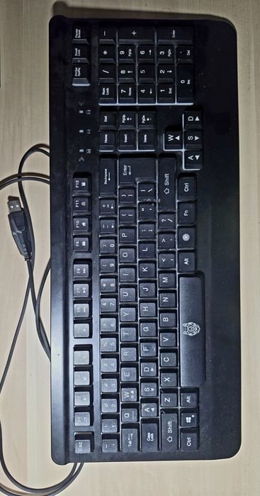 Gaming A+ Ghost wired gaming keyboard featuring a metal structure and rainbow LED backlighting