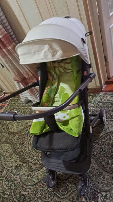 Коляска ало холатда