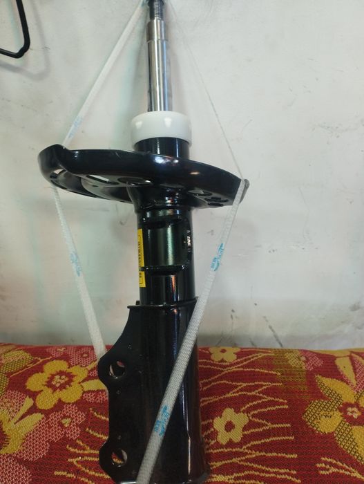 Малибу 2 амортизатор ,передний левый