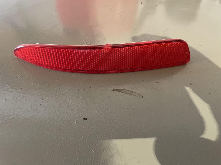 Отражатель заднего бампера е70 дорестайлинг, левая