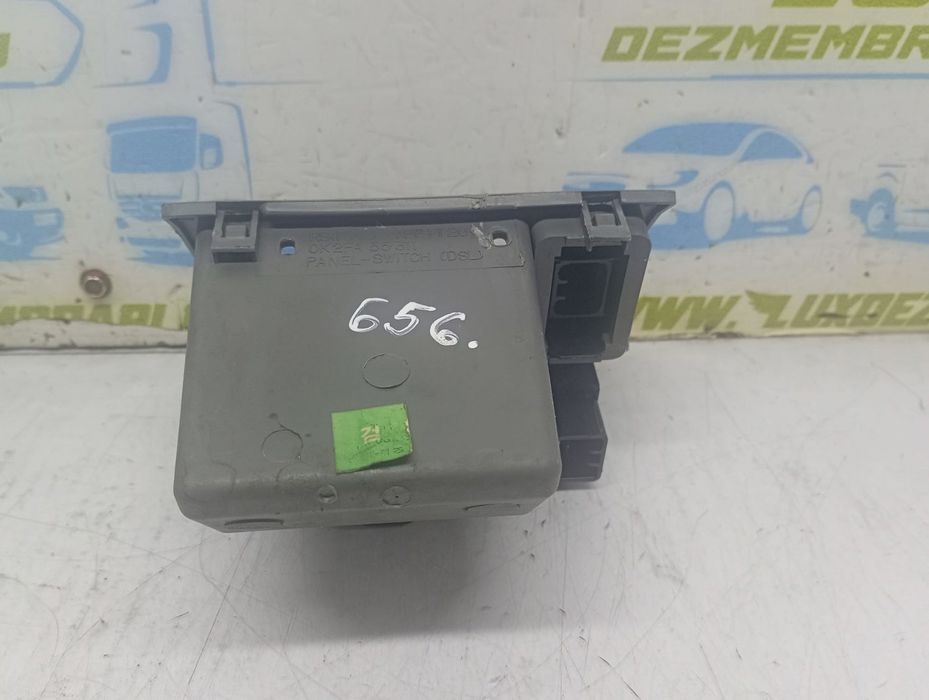 Panou butoane 0K2FA55311 Kia Carens 2 (2002 - 2006) 2.0 crdi D4EA