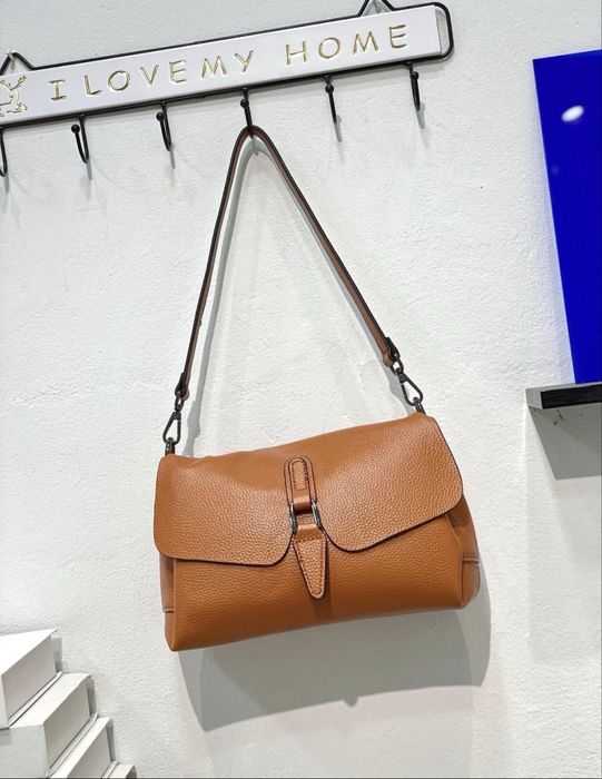 Сумка кожанная в рыжем цвете