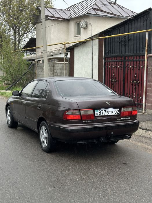 Тайота Карина Е 2 куб автомат